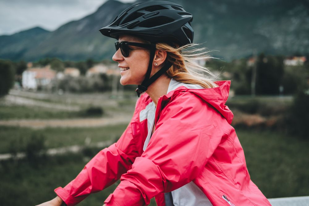 Smiling female riding bicycle