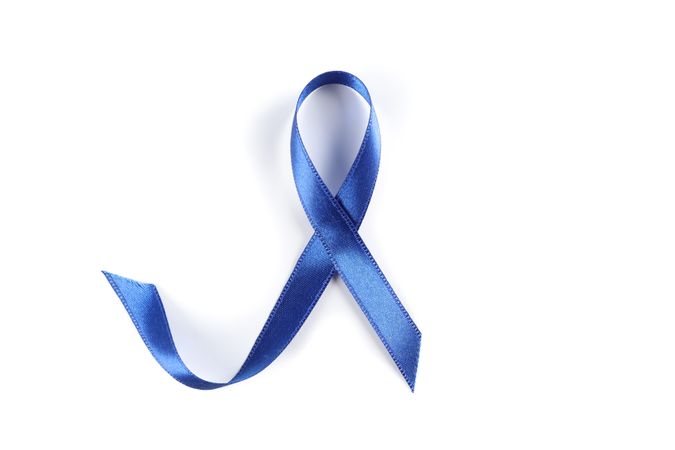 Blue awareness ribbon isolated on blank background