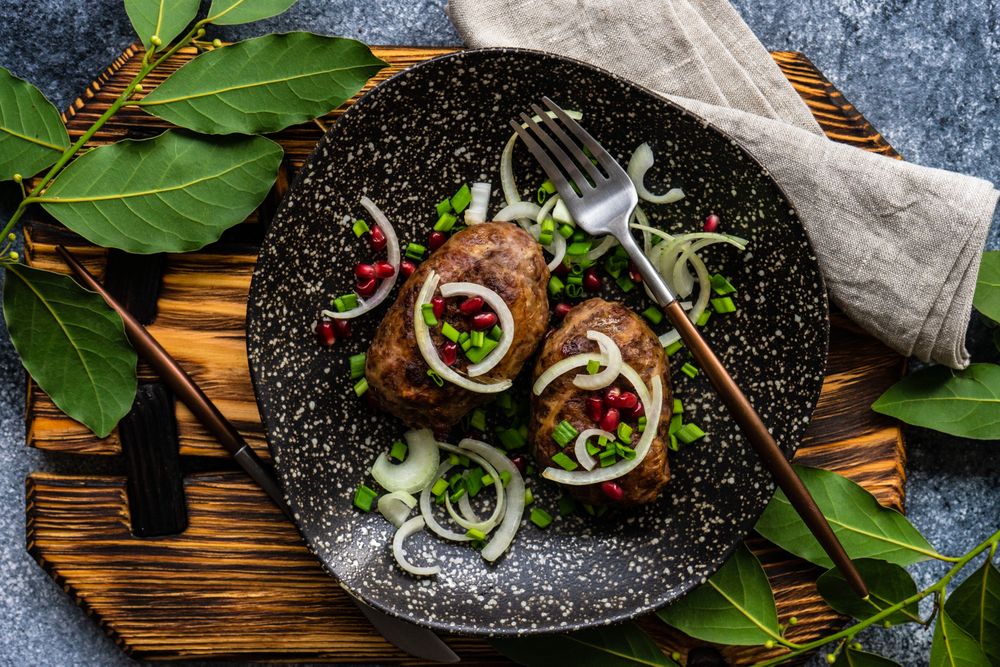 Top view of two abkhazura cutlets served on plate