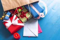 Shopping bag filled with gifts
