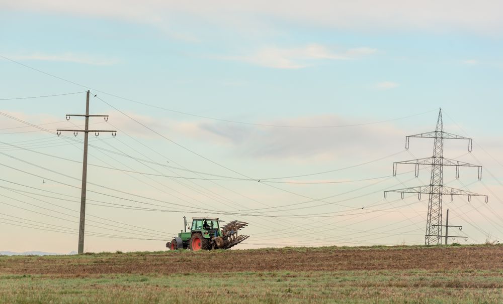 Tractor working the agricultural fields outside of Stuttgart city, Germany