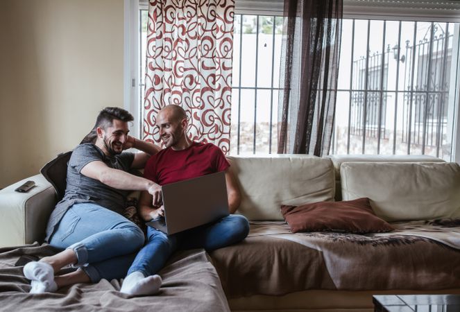 Gay couple with computer