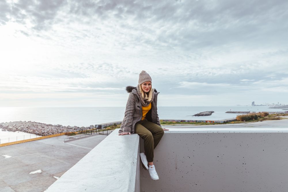Portrait of blonde woman posing in the city