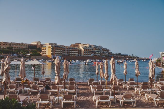 Empty lounge seats on beach