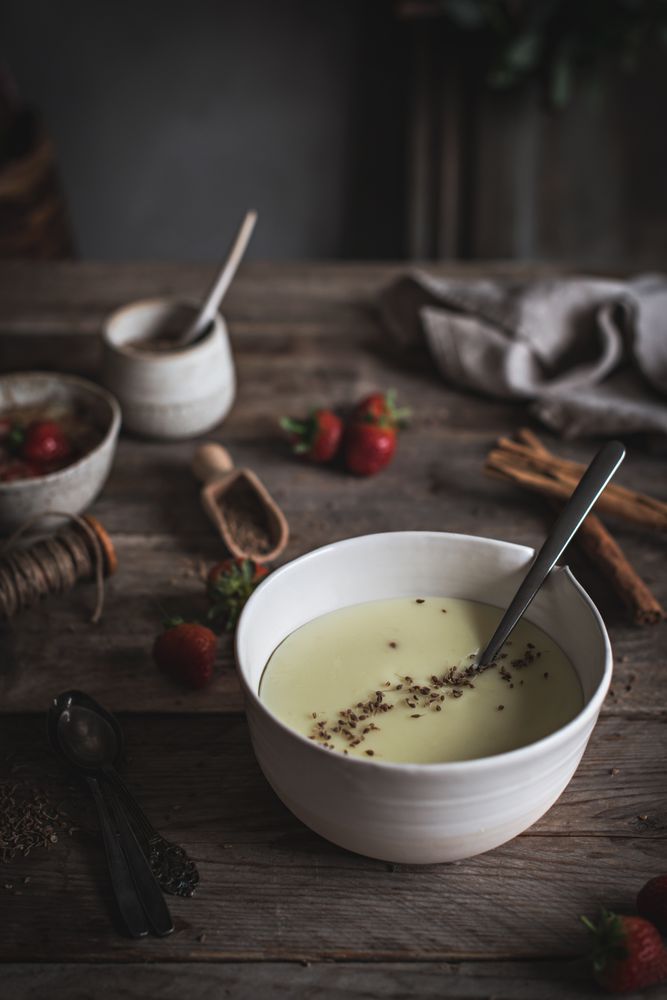 Strawberry porridge in bowl on table