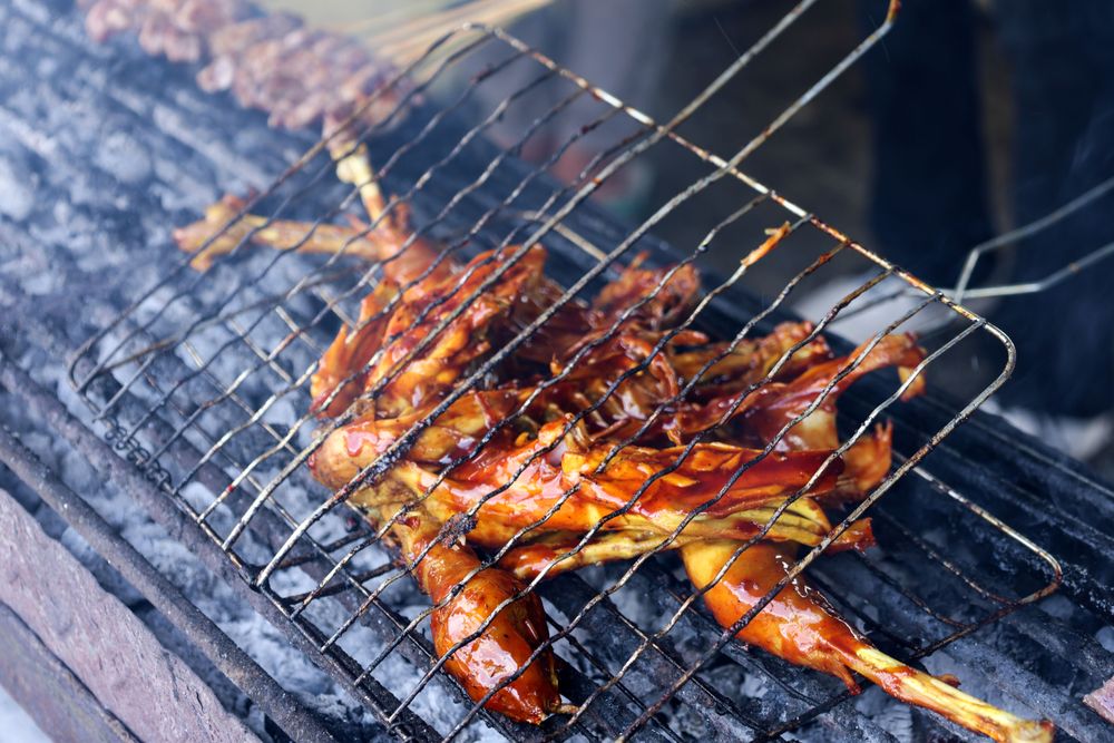 Close Up Making Ayam Bakar or Roasted Chicken