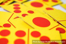Close up of red and yellow domino playing cards 5zrEqg