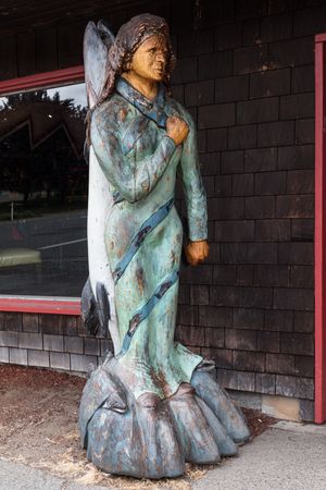 Wood carving of a fisherman, Langley, Washington