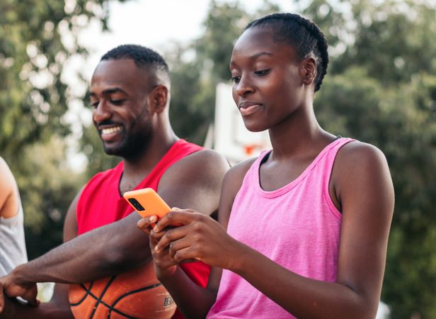 Using the smartphone on the court after a basketball game