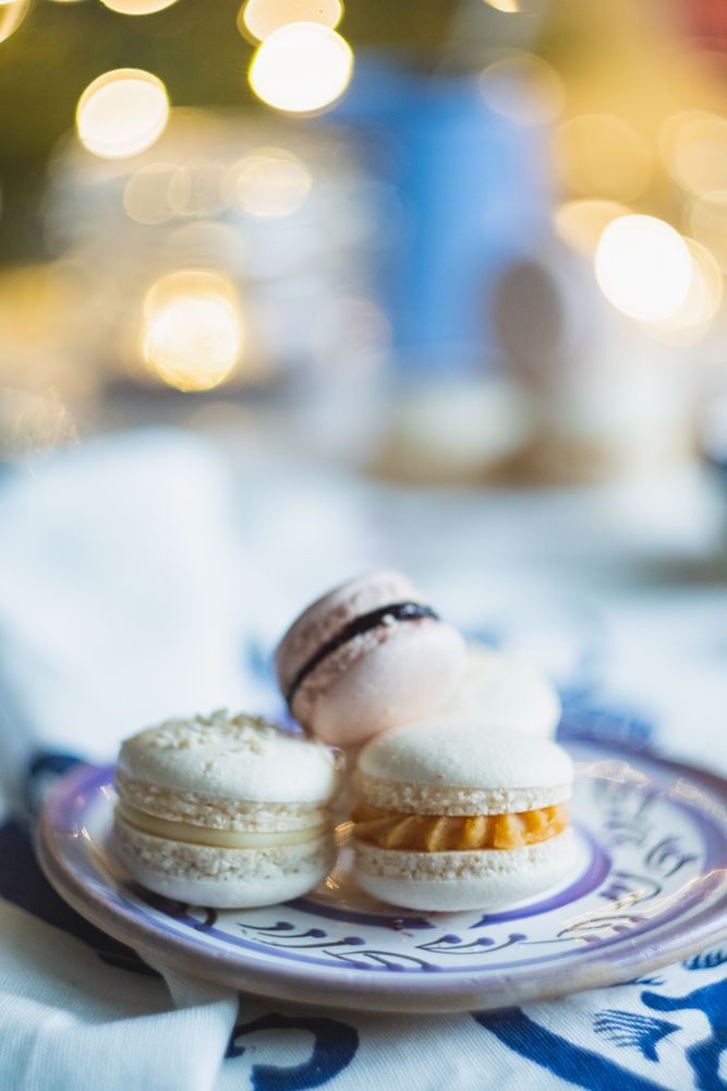 Close-up of festive macarons on dessert plate