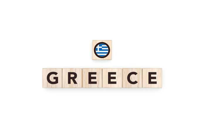 Wooden blocks bearing the name and flag of Greece.