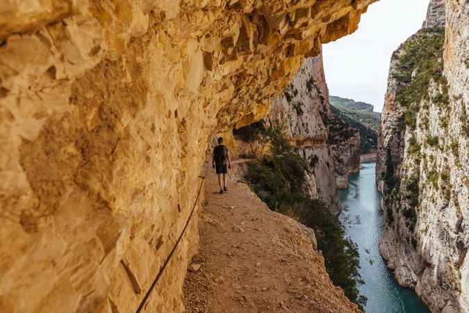 Man hiking through a gorge