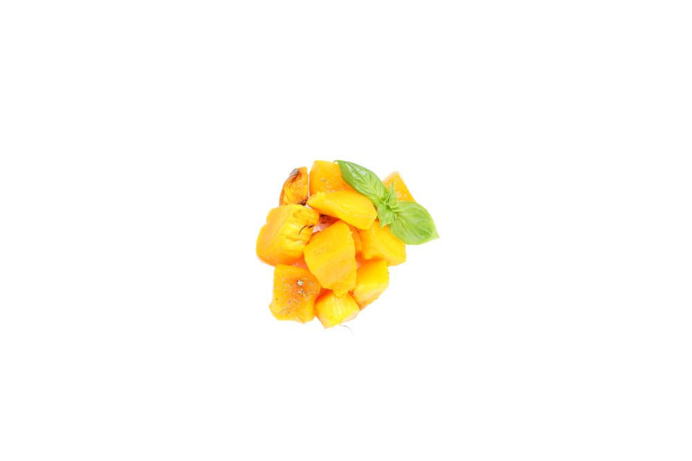 Baked pumpkin isolated on light background