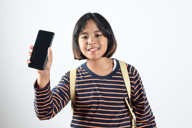 Asian School Kids Holding Screen Smartphone