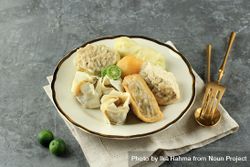 Plate of steamed dumplings, Baso Tahu Indonesian street food 56rVN5