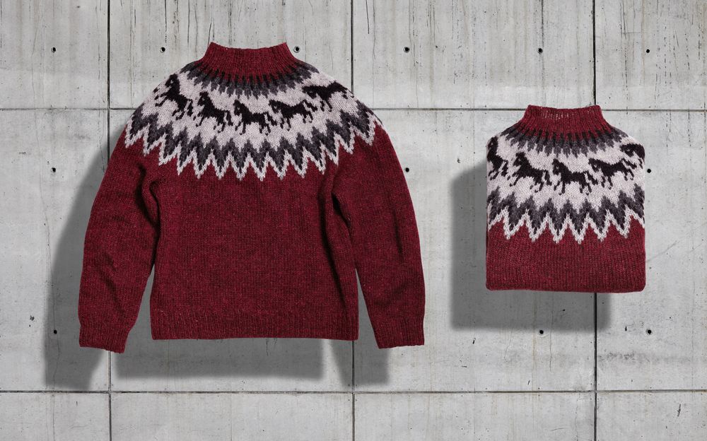 Winter sweater on concrete