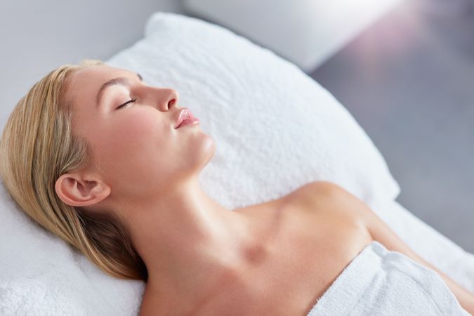 Woman relaxing after beauty treatment