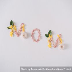“MOM” text made with flower petals and leaves bGWa2b