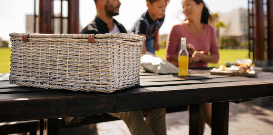 Close up of a picnic basket on a table