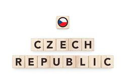 Wooden blocks bearing the name and flag of Czech Republic. Czech and European Culture, national identity, travel, and geography in a copy space design.