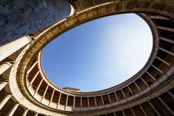 Clear sky seen from the interior of the Palace of Carlos V in the Alhambra in Granada