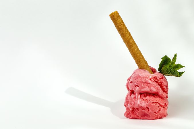 Strawberry ice cream scoops with waffle stick
