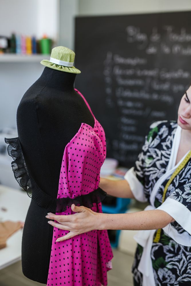 Woman in a sewing school