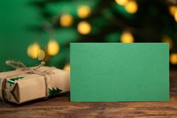 Christmas greeting card mockup with gifts