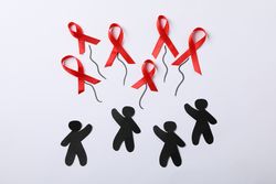 Awareness ribbons and people appliques on blank background, space for text