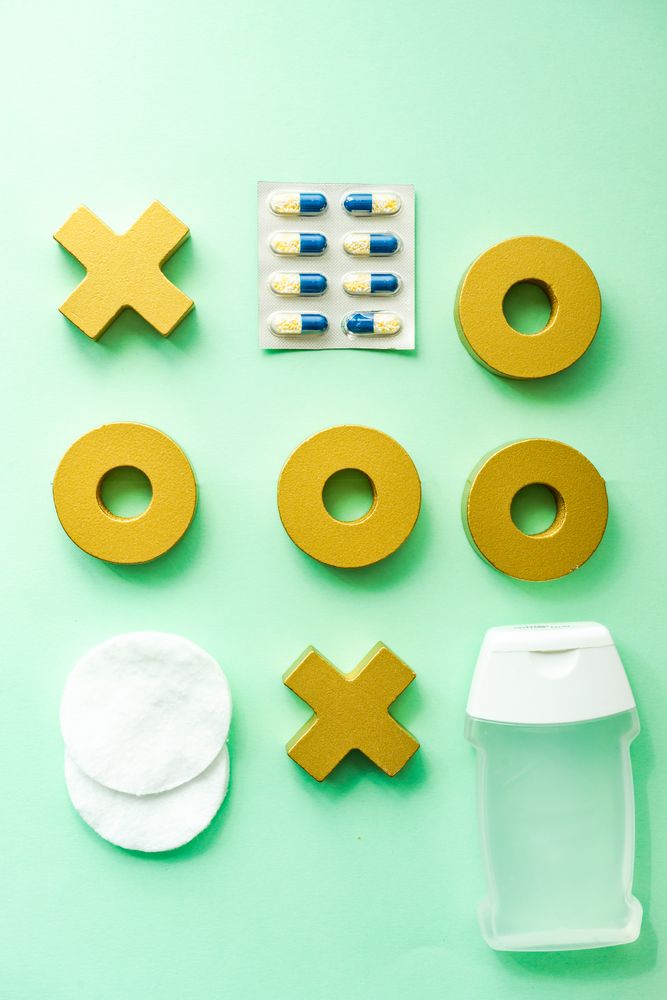 Covid-19 virus concept with tik tac toe game with medical accessories