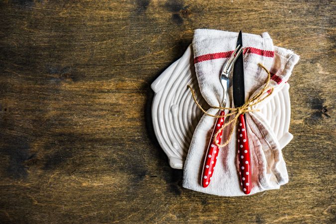 Vintage dotted dinnerware on wooden table