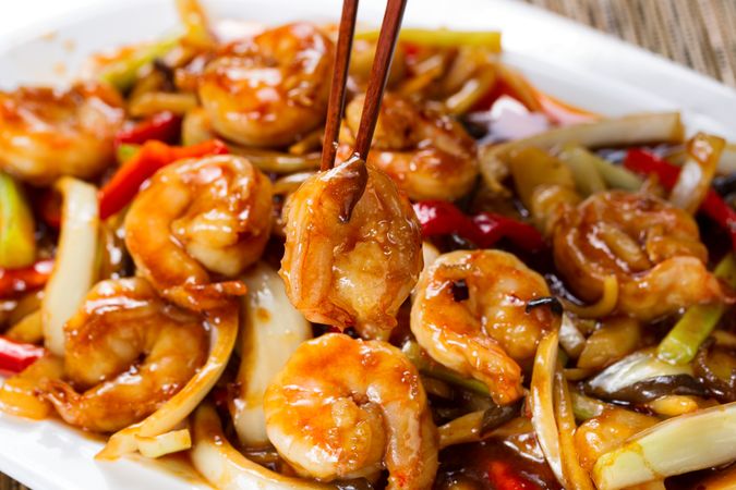 Curry shrimp and peppers on serving plate ready to eat