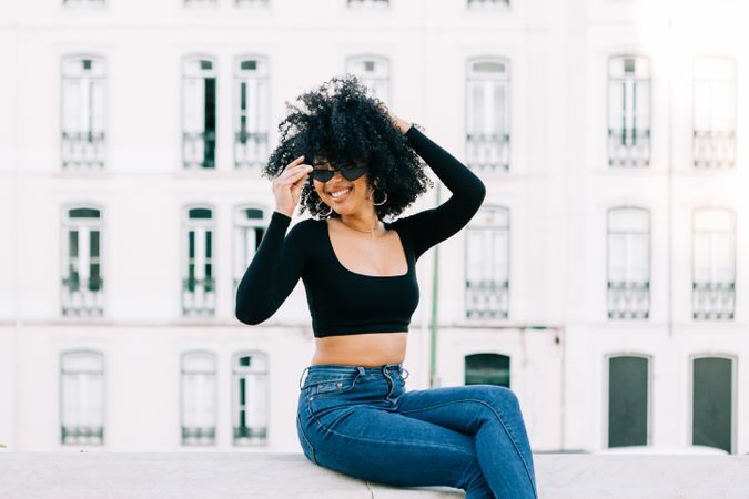 Fashionable female relaxing in city