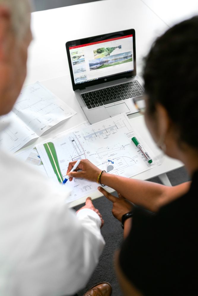 Two employees discussing strategy