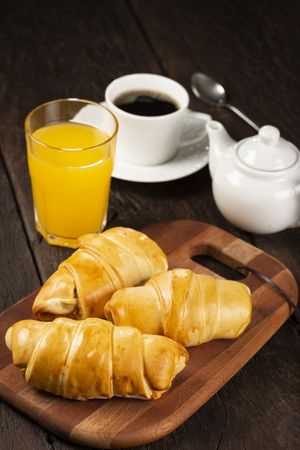 Traditional fresh baked croissants on the table.