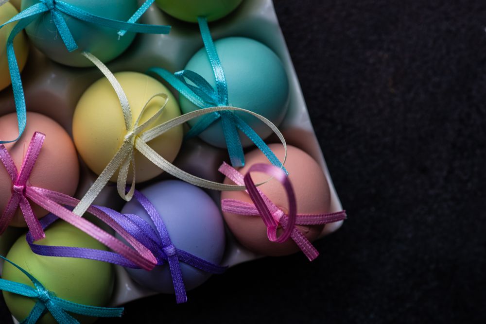 Top view of carton of pastel Easter eggs