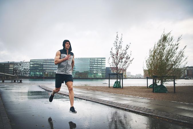 Man running outside on overcast day