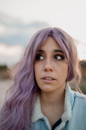 Casual woman in dry vegetation
