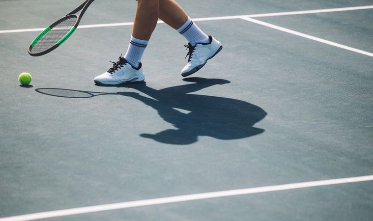 Cropped shot of sportsperson on tennis court