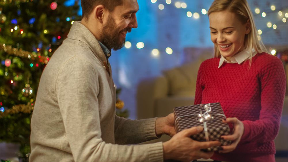 Man Gives Christmas Gift to His Girlfriend.