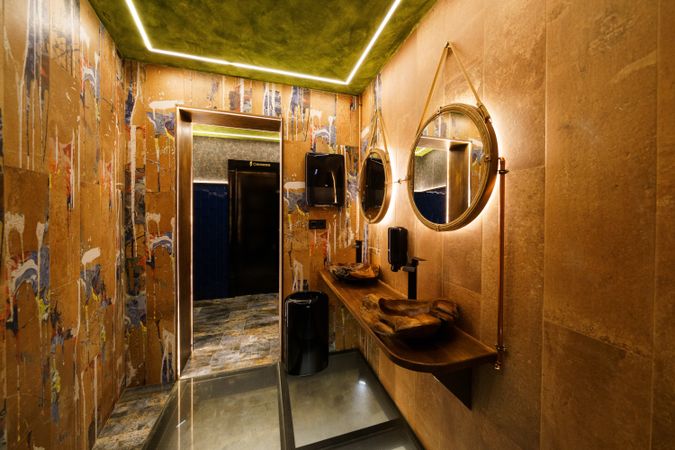 Brown bathroom in restaurant or bar