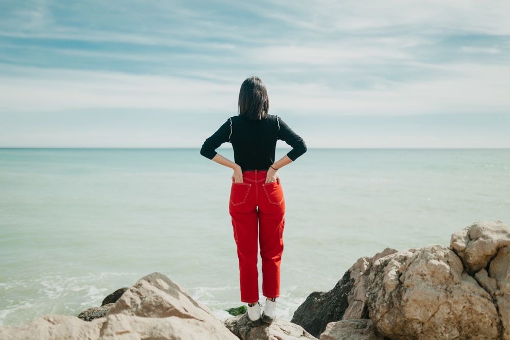 Anonymous female looking at sea