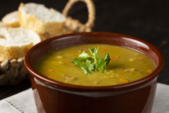 Pea soup. Bowl with pea soup on the table