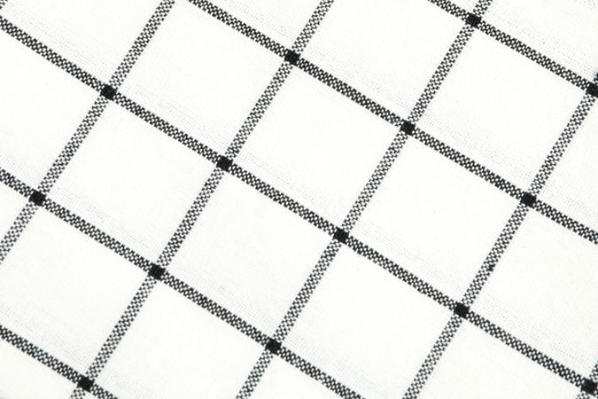 Folded fabric napkin as background, space for text