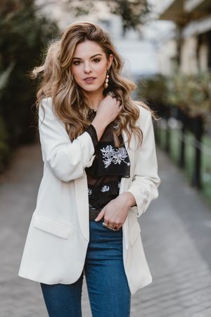 Charming woman posing on street
