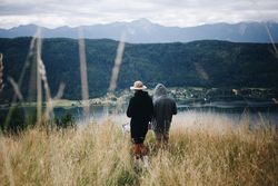 Couple overlooking hill