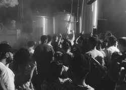 London, England, United Kingdom - Nov 9, 2022: B&W view of crowd on dance floor at festival