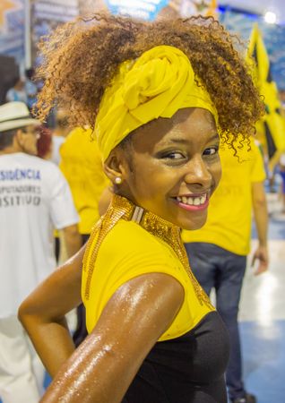Rio de Janeiro, Brazil - February 13 2014: Cheerful samba dancer looking at camera