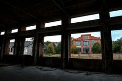 Facade of old building and cloudy sky