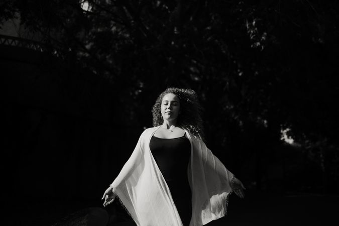 Sensual woman dancing in nature